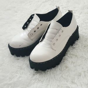 White and black platform Oxford shoes